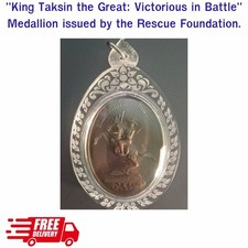 King Taksin the Great, mounted on horseback, proclaims victory—depicted alongsid picture