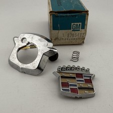 NOS OEM GM 1971-1978 Cadillac Eldorado TRUNK LOCK COVER 8705472 9833483 picture