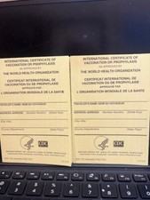 TWO (2) International Certificate Of Vaccination - Yellow Card -  COLLECTIBLE picture
