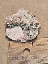 Beautiful Pyrite On  Rhodochrosite specimen picture