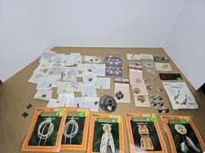 NOS LARGE LOT OF WESTERN CHARMS-- ORNAMENTS-- CONCHOS picture