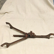 Vintage Cast Iron Adjustable Rim Spreader picture
