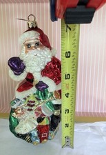 Christopher Radko Sack of Toys Glass Ornament.  Pre owned in excellent condition picture