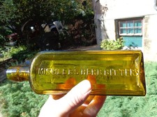 Antique Mishler's Herb Bitters Bottle, Dr. S.B. Hartman & Co. Yellow Amber picture
