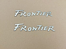 1998-2001 NISSAN FRONTIER DOOR EMBLEM USED OEM picture