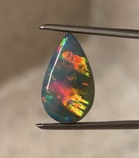 Rare Honduras seam opal w/ Ribbon Fire Patterns 3.15ct Collector quality gem picture
