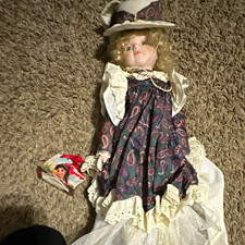The Heritage Mint Porcelain Girl Doll Blonde Curly Hair Blue Eyes Dress & Hat picture