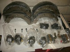 MGA NEW FRONT AND REAR BRAKE SHOES , 2 SETS AND 6 WHEEL CYLINDERS , 4 FT 2 REAR picture