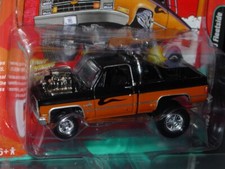 JOHNNY LIGHTNING 1985 CHEVY SILVERADO ZINGERS PICKUP TRUCK -Black/Orange MIP picture