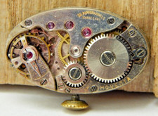 Vintage Hoverta 15 jewel 3 adjustment wrist watch movement with dial and hands picture