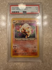2002 LIGHT ARCANINE HOLO 12/105 NEO DESTINY POKEMON PSA 5 “SWIRL”.     CLEAN picture