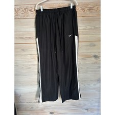 Men’s Vintage Nike Black Track Pants with White Side Stripes picture