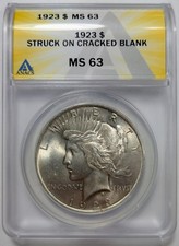 1923 Peace Silver Dollar ANACS MS-63 Struck on Cracked Blank Planchet Mint Error picture