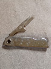 Vintage Bassett Folding Nail Care Tool. picture