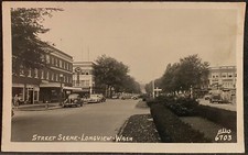 Real Photo Postcard RPPC Longview WA Street Scene w Old Autos Rexall Drug Store picture