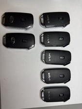 OEM Used Kia Smart Keys Lot of 7 4-Button Locked Mixed Cut Blades Locksmith picture