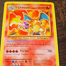 The Pokémon Company Charizard 4/102 Base Set Shadowless Holo Rare English 1st picture
