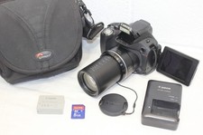 Canon Powershot SX40 HS 12.1 MP Digital Camera Bundle, clean WORKS GREAT picture