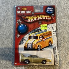 HOT WHEELS 2006 HOLIDAY RODS GOLD '70 PLYMOUTH SUPERBIRD CAR  NIP  REAL RIDERS picture