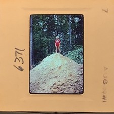 Vintage 1971 35mm Color Slide Boy on Dirt Pile Woods Nature Snapshot picture