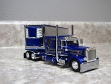 DCP 1/64 Elite Money Blue Peterbilt 389 Utility Refrigerated Trailer 60-2302 picture
