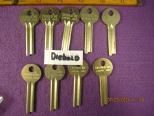 9 PC NEW OLD STOCK  DIEBOLD INC. SAFETY DEPOSIT BOX UNCUT KEY BLANKS BRASS. picture