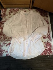 Uniqlo pink button up top with ruffle front picture