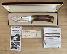 1995 BUCK #191 CLUB ZIPPER KNIFE NEVER USED IN BOX  Serial # 129/150 VINTAGE picture