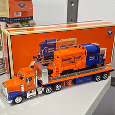 Lionel TMT-18416 LT-702 Lionel Lines Flatbed Toy Truck with Diesel Locomotive picture