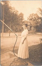 RPPC Teenage Girl Watering Plants with Hose Birmingham Alabama 1910 Occupational picture