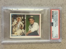 1986 EDICIONES ESTE SUPER STARS 198 CHRISTOPHER LLOYD/MICHAEL J. FOX PSA 5 picture
