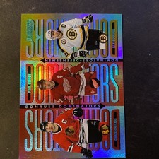 1996-97 Donruss - Dominators Ray Bourque, Paul Coffey, Chris Chelios #3 /5000 picture