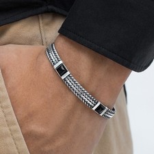 An elegant silver and onyx bracelet inspired by the allure of an Italian night picture