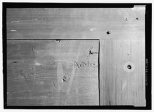 Photo:1900s Interior Graffiti on Wooden Partition Wall Close-Up picture