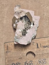 Beautiful Pyrite On  Rhodochrosite specimen picture