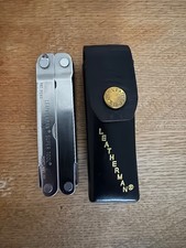 Vintage Leatherman Super Tool from July 1997 with leather sheath picture