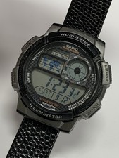 Vintage Men's Casio World Time 5 Alarms 100M Water Resist Quartz Watch AE-1000W picture