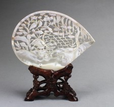 A Carved Mother-of- pearl Ornament. Comes fitted with a stand. picture