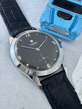 VINT Universal Geneve   black   dial  wind up  cal 262 swiss  ca 55 NO RESERVE picture
