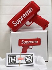 Supreme Cash Cannon Money Gun With Stack Of New SUPREME MONEY picture