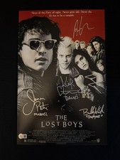 The Lost Boys cast signed (Names in Disc) 11x17 photo W/Beckett witnessed COA picture