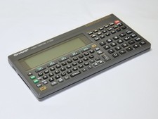 SHARP PC-E500 Pocket Computer Electronic Calculator Black Design Parts H054 picture