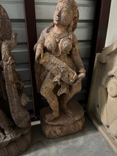 Stone Sculpture of Dancing Lady playing drum picture
