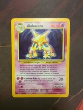 1999 Pokémon Base Set Alakazam Holo Rare #1/102 Unlimited picture