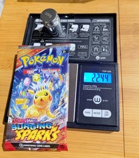 Pokemon TCG Surging Sparks SUPER HEAVY 22.44g Sealed Booster Pack. picture