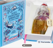 Alice’s in Wonderland Memorabilia Lewis Carroll Leather Bound Hardcover w/ Flask picture