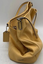 Coach handbag yellow new with out tag medium picture