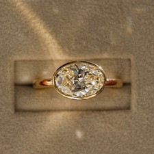 1.99 CT Oval Cut Moissanite Bezel Set Engagement Ring 14K Yellow Gold Plated picture