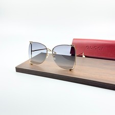 Gucci GG0252S Sunglasses Gold Frame Gray Gradient Lens New w/ Box picture