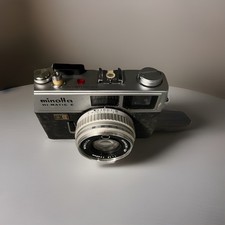 Vintage Minolta Hi-Matic E35mm   Film Camera | Rokkor-QF 40mm f/1.7 Lens. case picture